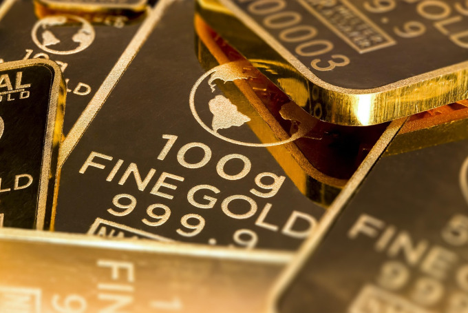 Stacked gold bars representing the RedTiger Asean welcome bonus